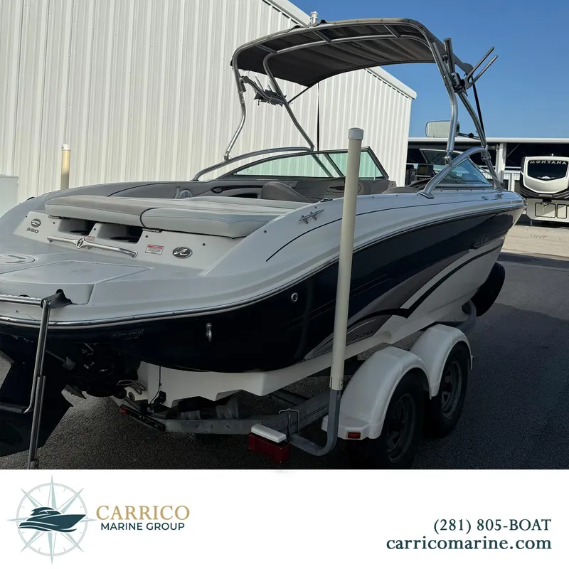 Slide: The Image of 2003 Sea Ray 220 Bow Rider on trailer at Carrico Marine Group. - 5