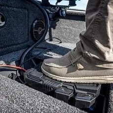 Slide: The Image of Foot on Lund 2075 IMPACT XS boat deck, showcasing interior details and equipment. - 19