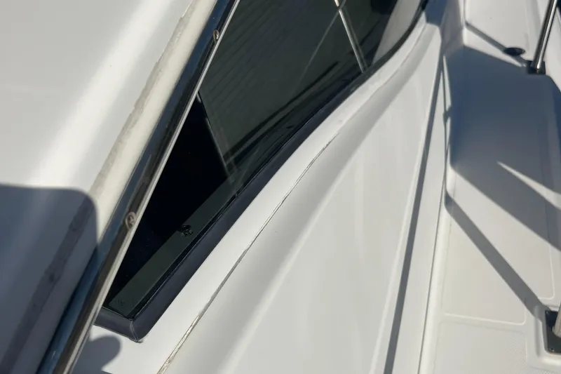 Slide: The Image of Close-up of 2000 Cruisers Yachts 4450 Motor Yacht deck and window detail. - 16