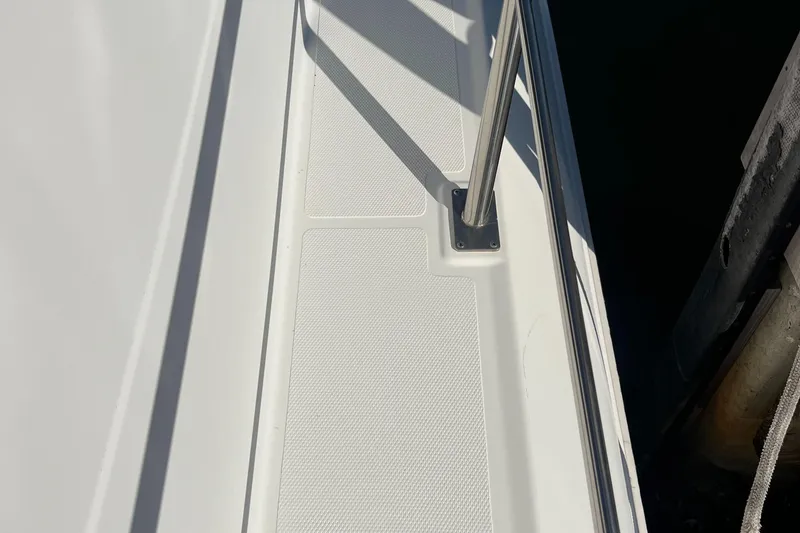 Slide: The Image of Close-up of 2000 Cruisers Yachts 4450 Motor Yacht deck with railing. - 17