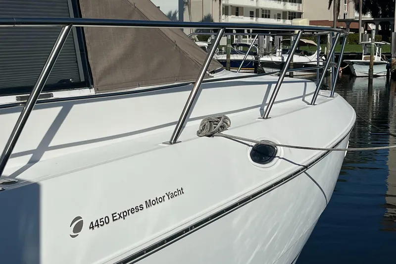 Slide: The Image of 2000 Cruisers Yachts 4450 Motor Yacht docked at marina. - 2