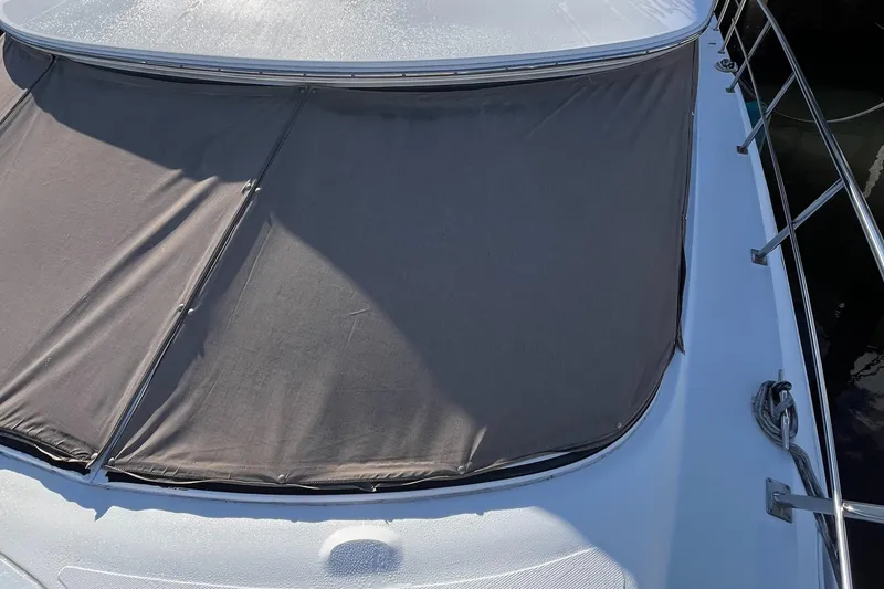 Slide: The Image of 2000 Cruisers Yachts 4450 Motor Yacht with sunshade cover on deck. - 30