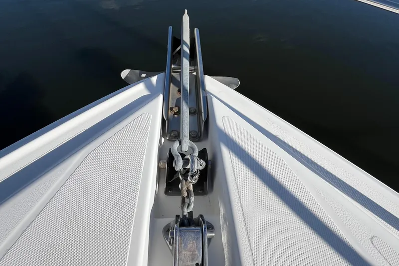 Slide: The Image of Bow view of 2000 Cruisers Yachts 4450 Motor Yacht with anchor and chain. - 26