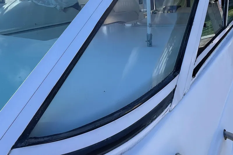 Slide: The Image of Close-up of 2000 Cruisers Yachts 4450 Motor Yacht window and deck. - 34
