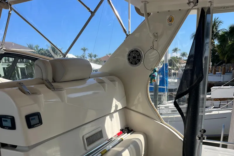 Slide: The Image of Interior of 2000 Cruisers Yachts 4450 Motor Yacht with seating and marina view. - 48