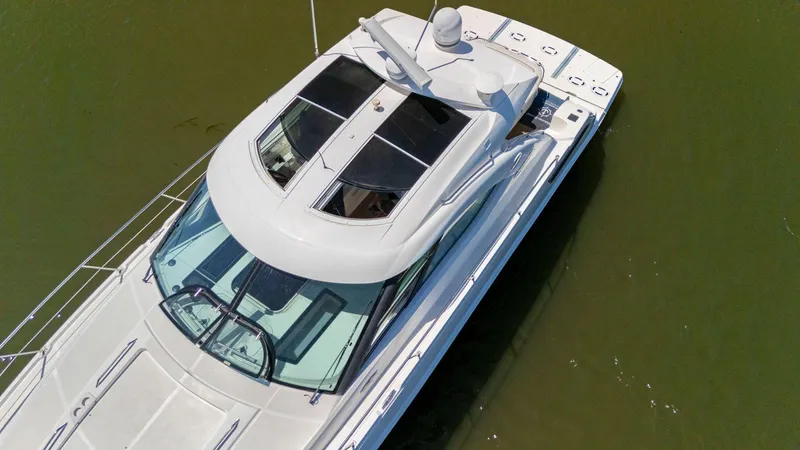 Slide: The Image of 2009 Sea Ray 43 Sundancer yacht, aerial view, on calm water. - 18
