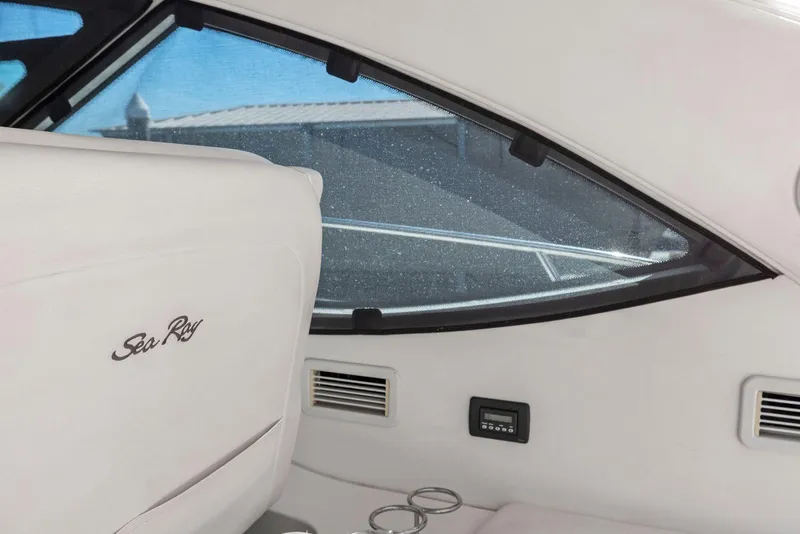 Slide: The Image of Interior view of 2009 Sea Ray 43 Sundancer with branded seating and window. - 31