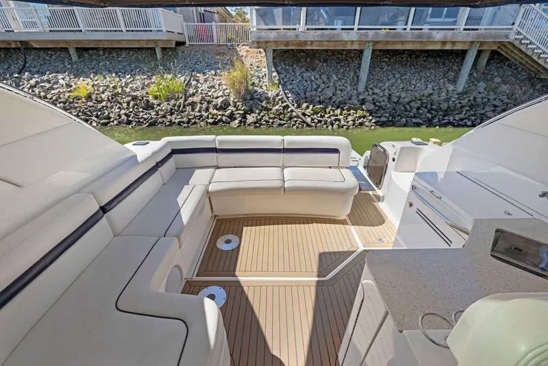 Slide: The Image of 2009 Sea Ray 43 Sundancer yacht interior with spacious seating and elegant design. - 36