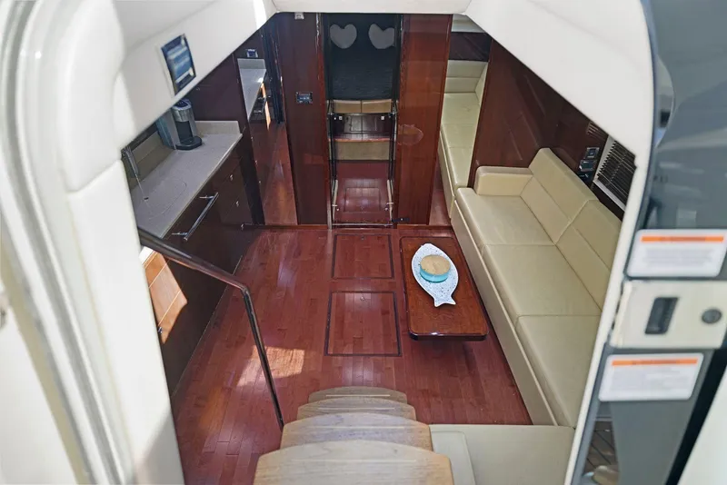 Slide: The Image of Luxurious interior of 2009 Sea Ray 43 Sundancer yacht with elegant wood flooring. - 45