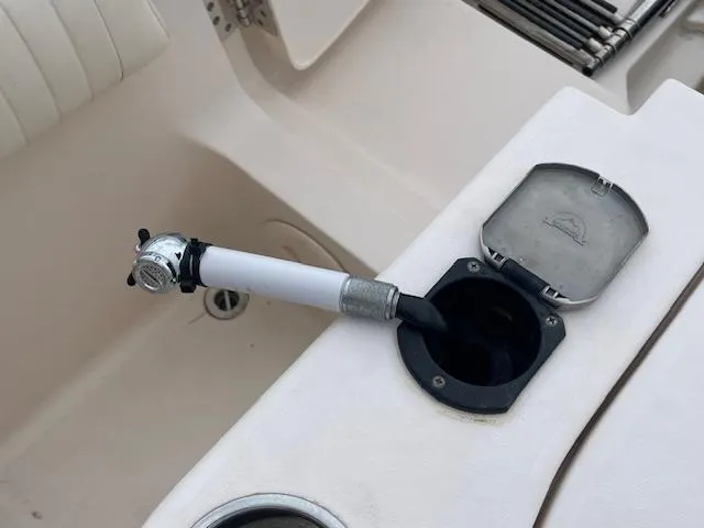 Slide: The Image of 2012 Grady-White 271 Canyon boat with a fishing rod holder. - 38