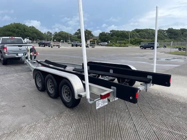 Slide: The Image of Trailer for 2012 Grady-White 271 Canyon boat in parking lot. - 45