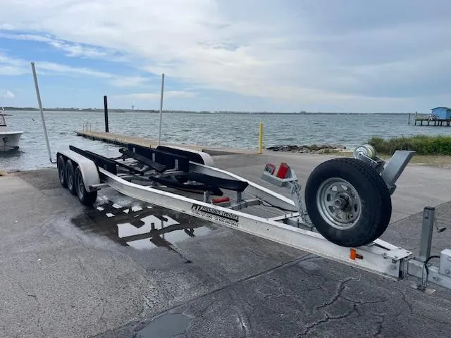 Slide: The Image of Boat trailer near waterfront, designed for 2012 Grady-White 271 Canyon. - 46