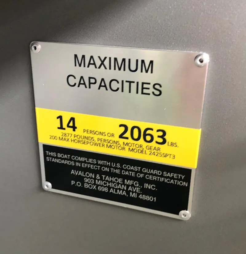 Slide: The Image of Maximum capacity plate for 2022 Tahoe Pontoon GT 2585 RF, 14 persons or 2063 lbs. - 17