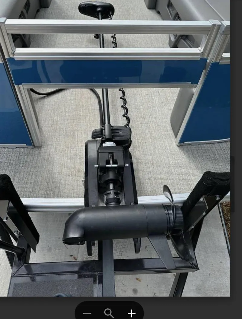 Slide: The Image of 2022 Tahoe Pontoon GT 2585 RF with trolling motor on deck. - 2