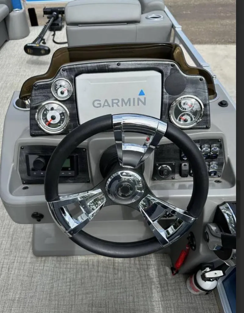 Slide: The Image of Steering console of 2022 Tahoe Pontoon GT 2585 RF with Garmin navigation system. - 4