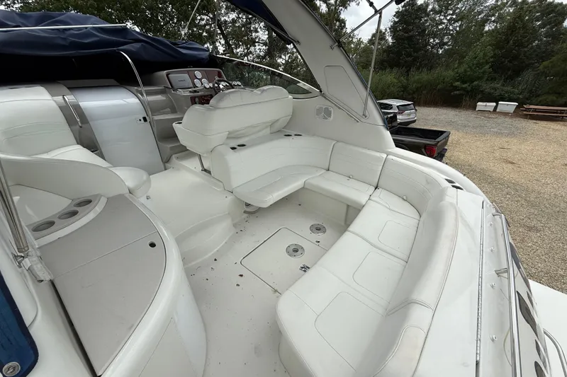 Slide: The Image of 2003 Formula 37 PC yacht interior with white seating and control panel. - 4