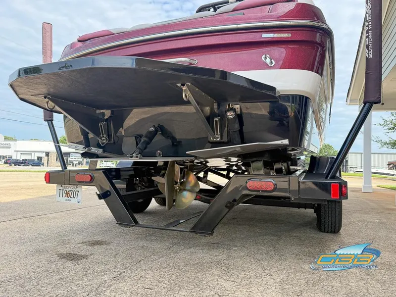Slide: The Image of 2019 Moomba Craz boat on trailer, rear view showing propeller and hull design. - 10