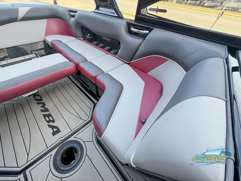 Slide: The Image of 2019 Moomba Craz boat interior with stylish red and gray seating. - 14
