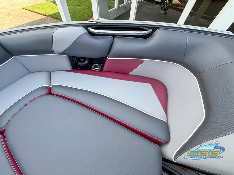 Slide: The Image of 2019 Moomba Craz boat interior with stylish gray and red seating. - 17