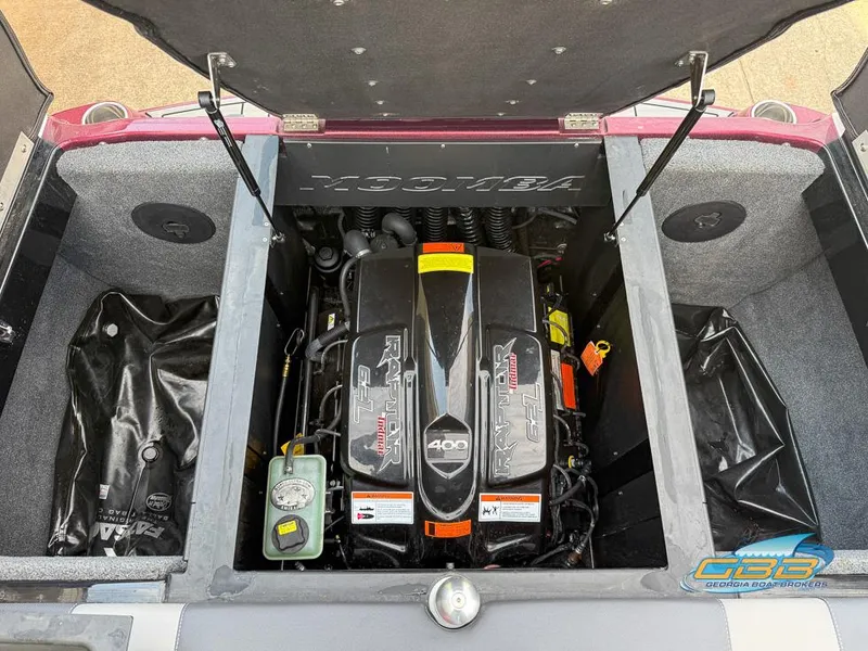 Slide: The Image of 2019 Moomba Craz engine compartment with Raptor 400 engine, open storage areas. - 21