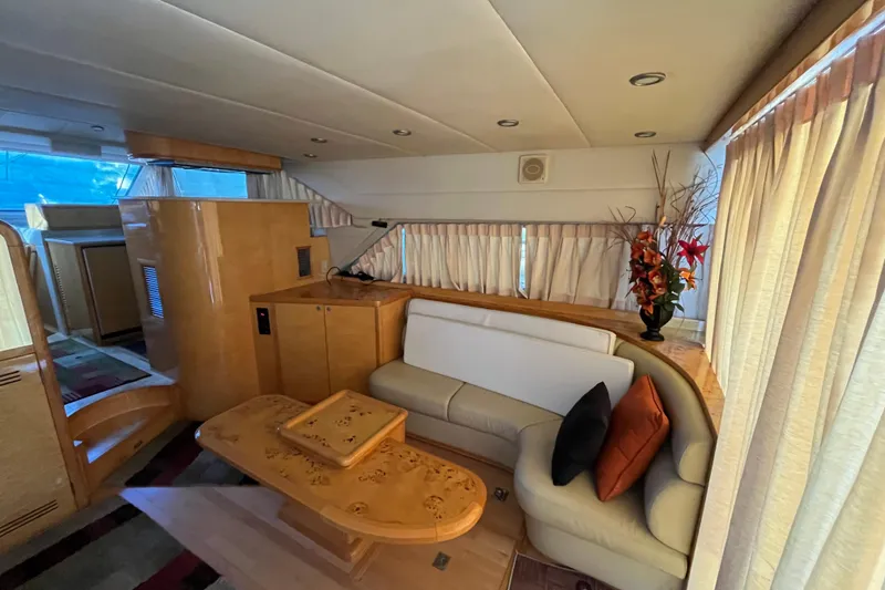 Slide: The Image of Luxurious interior of 2001 Jefferson International 5300 yacht with elegant seating and decor. - 14