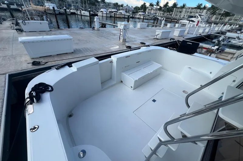 Slide: The Image of Spacious deck of 2001 Jefferson International 5300 yacht docked at marina. - 9