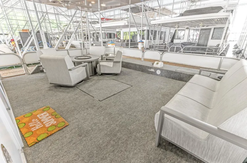 Slide: The Image of Spacious deck of 1997 Sumerset 18 x 93 houseboat with seating and table. - 25