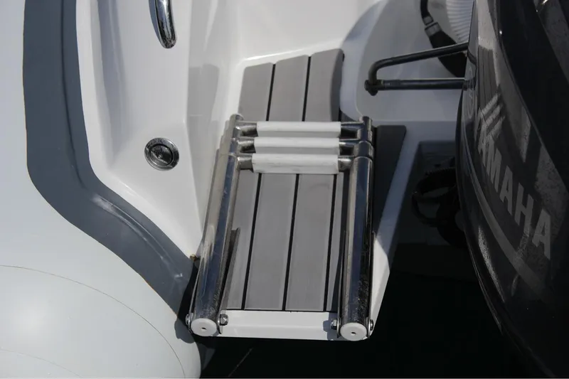 Slide: The Image of Manufacturer Provided Image: 2022 Walker Bay Venture 14 boat with Yamaha motor and foldable swim ladder. - 11