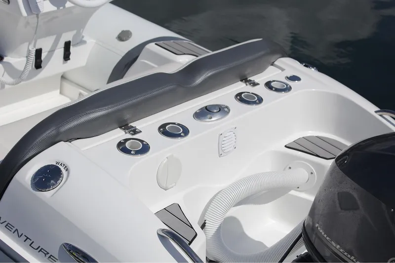 Slide: The Image of Manufacturer Provided Image: 2022 Walker Bay Venture 14 boat console with controls and seating. - 8