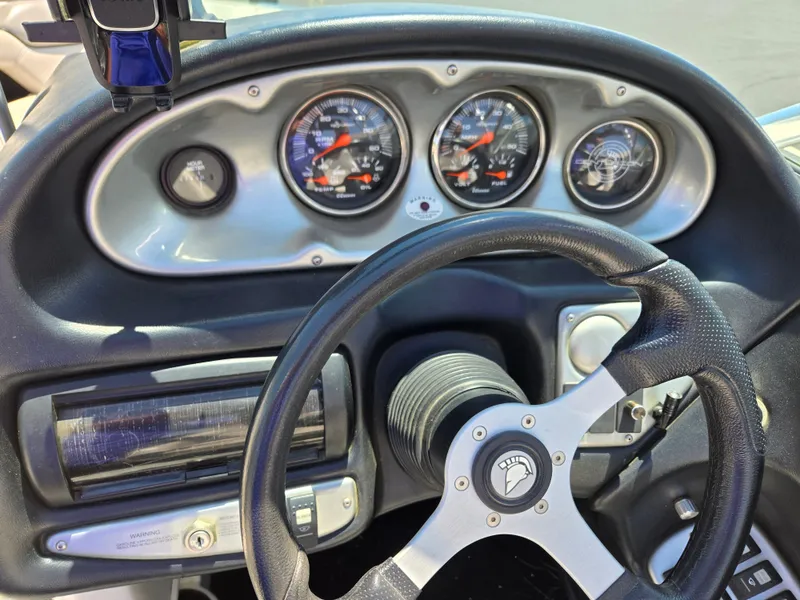 Slide: The Image of 2007 Centurion Air Warrior Elite V-Drive C4 dashboard with steering wheel and gauges. - 12