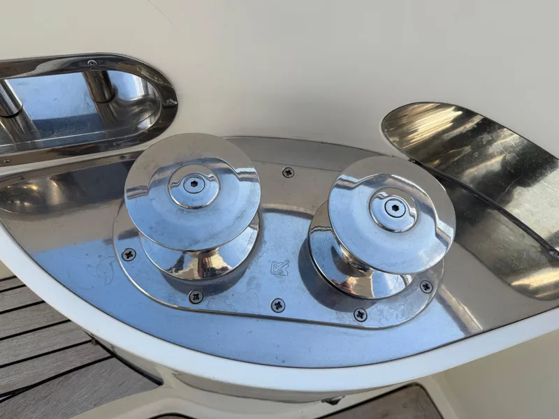 Slide: The Image of Chrome winches on 1996 Azimut 54 yacht deck, reflecting sunlight. - 19