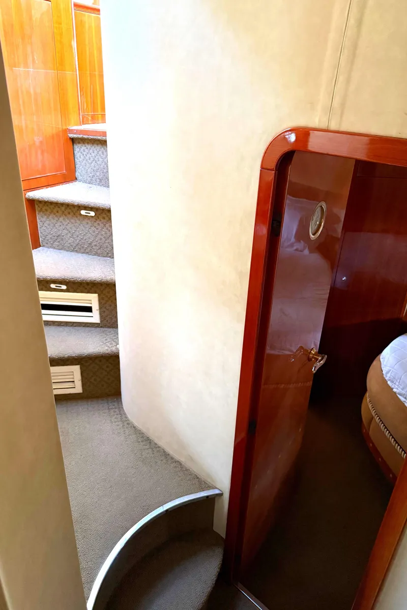 Slide: The Image of Interior of 1996 Azimut 54 yacht showing stairs and cabin entrance. - 49