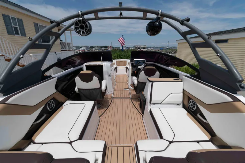 Slide: The Image of 2021 Yamaha Boats 252S interior with luxurious seating and modern design. - 4