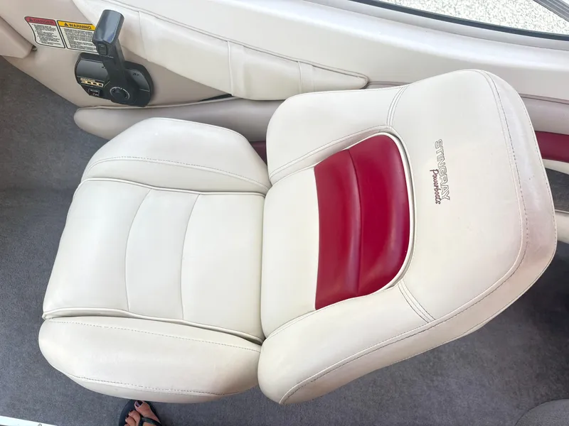 Slide: The Image of 1999 Stingray 190 LS boat seat with white and red upholstery. - 17
