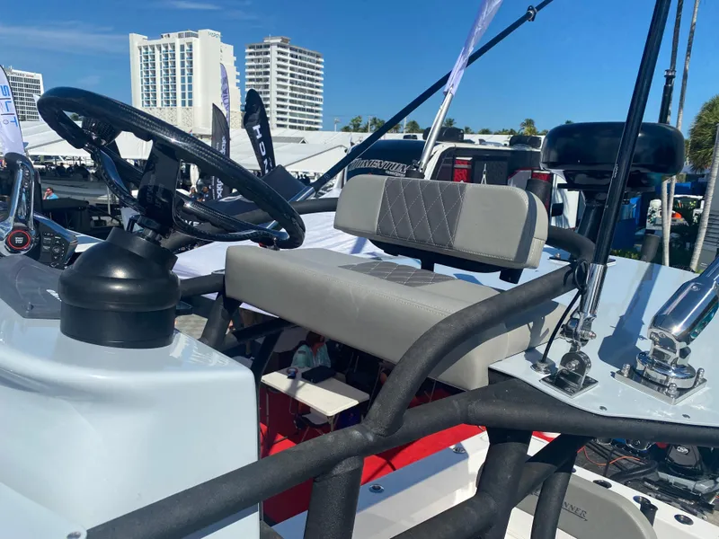 Slide: The Image of Reef Runner 230 C Open 2026 boat in harbor. - 24