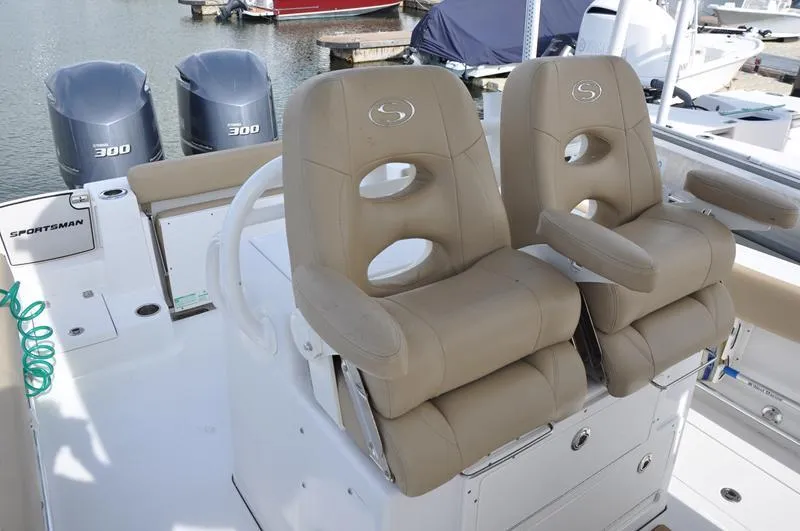 Slide: The Image of 2017 Sportsman Open 282 Center Console boat with dual seats and twin 300 engines. - 16