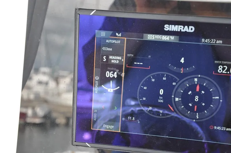 Slide: The Image of Simrad autopilot display on 2017 Sportsman Open 282 Center Console boat. - 26