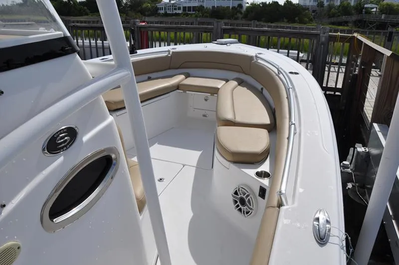Slide: The Image of 2017 Sportsman Open 282 Center Console boat with beige seating and sleek design. - 31