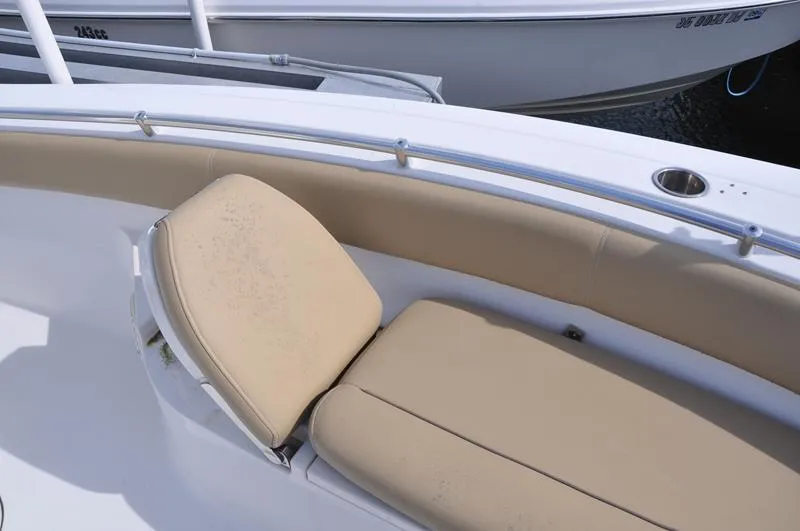 Slide: The Image of 2017 Sportsman Open 282 Center Console boat with beige seating and stainless steel rail. - 34