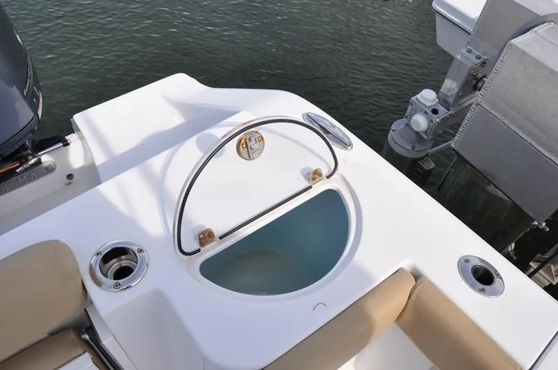 Slide: The Image of 2017 Sportsman Open 282 Center Console boat with livewell and rod holders. - 38