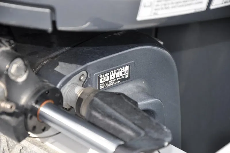 Slide: The Image of Close-up of Yamaha LF300XCA engine on 2017 Sportsman Open 282 Center Console boat. - 40