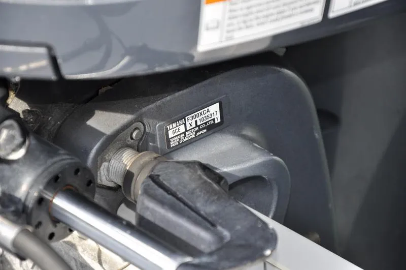 Slide: The Image of Close-up of a Yamaha F300XCA engine part on a 2017 Sportsman Open 282 Center Console boat. - 41