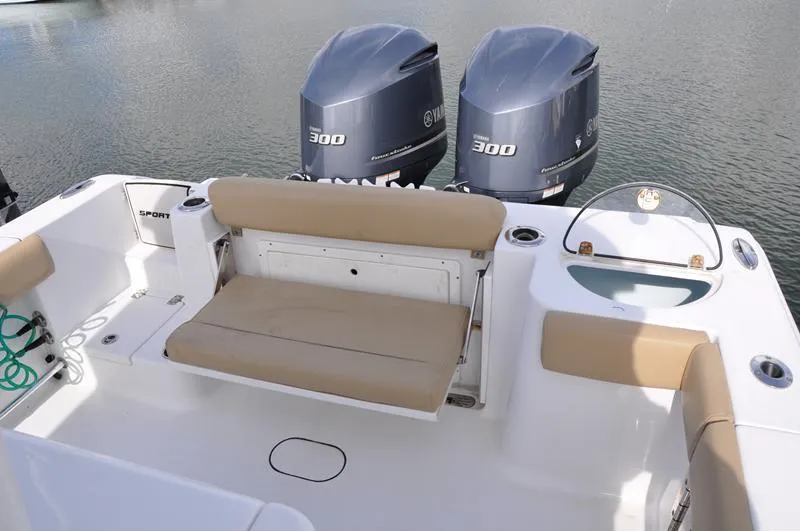 Slide: The Image of 2017 Sportsman Open 282 Center Console boat with twin Yamaha 300 engines. - 7