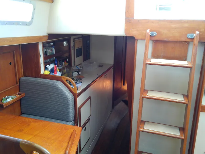 Slide: The Image of Engine of a 1980 Whitby Yachts 42, painted red. - 27