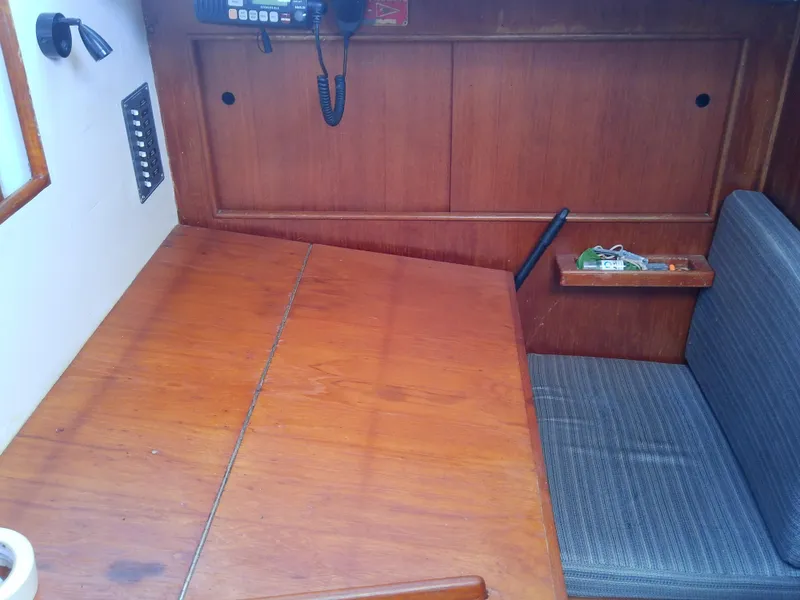 Slide: The Image of Engine room of a 1980 Whitby Yachts 42 with hoses and pipes. - 28