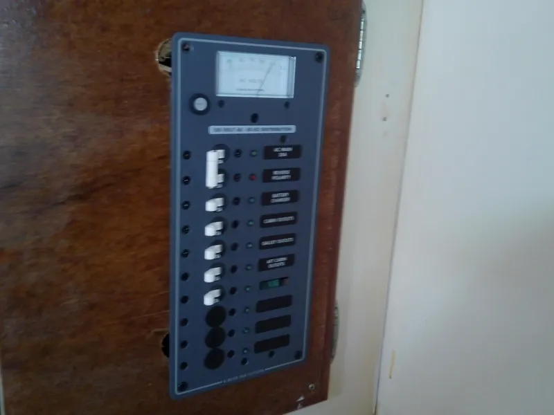 Slide: The Image of 1980 Whitby Yachts 42 bathroom with toilet, sink, and storage cabinets. - 40