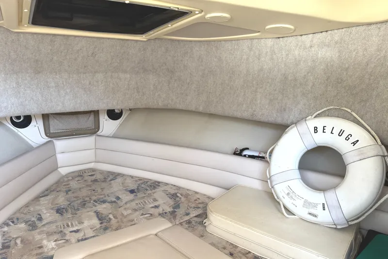 Slide: The Image of Interior of 2003 Grady-White Marlin 300 boat with life preserver and seating area. - 30