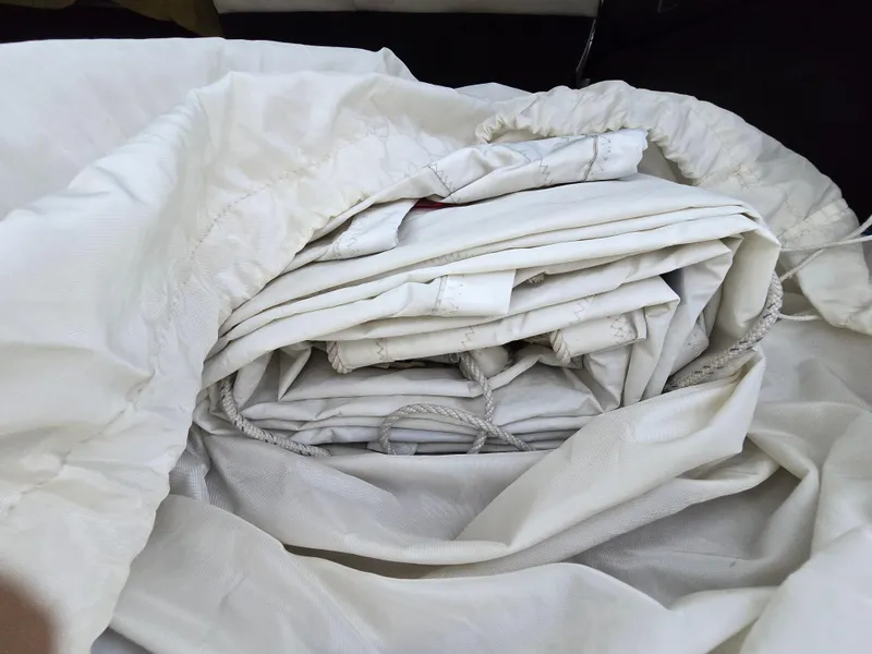Slide: The Image of Folded white sailcloth with ropes, stored in a bag, Bristol 31.1, 1984 model. - 18