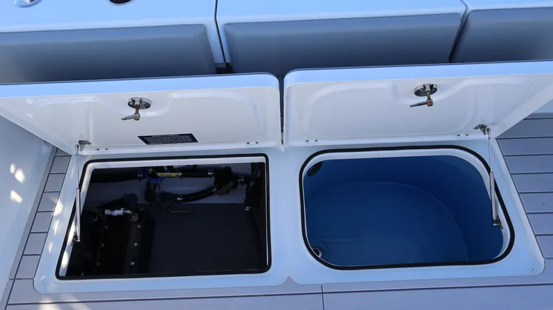 Slide: The Image of Freeman 47 boat storage compartments, 2021 model, open on deck. - 21