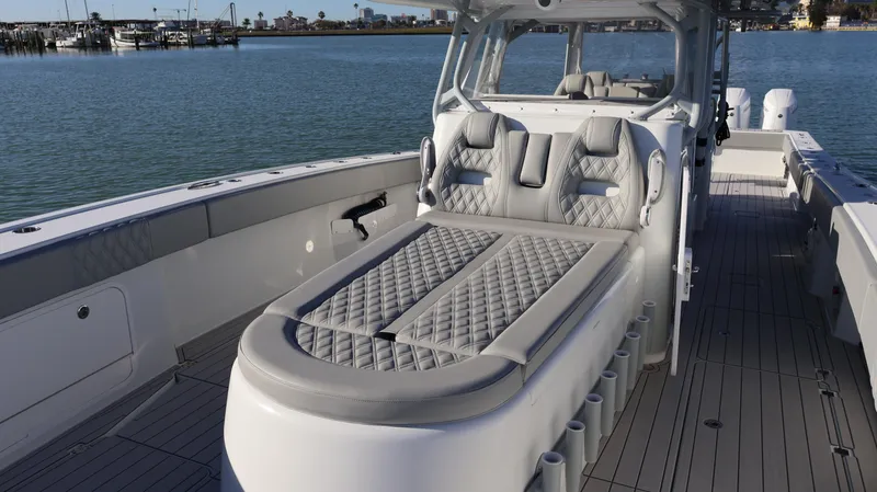 Slide: The Image of Luxury Freeman 47 boat interior, 2021 model, featuring elegant seating and spacious deck. - 29
